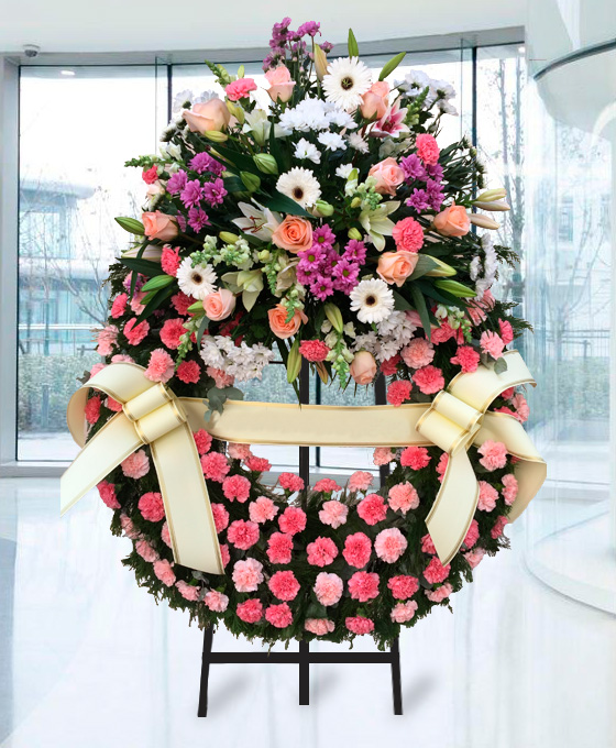 Enviar Coronas funerarias en tonos rosas para funeral